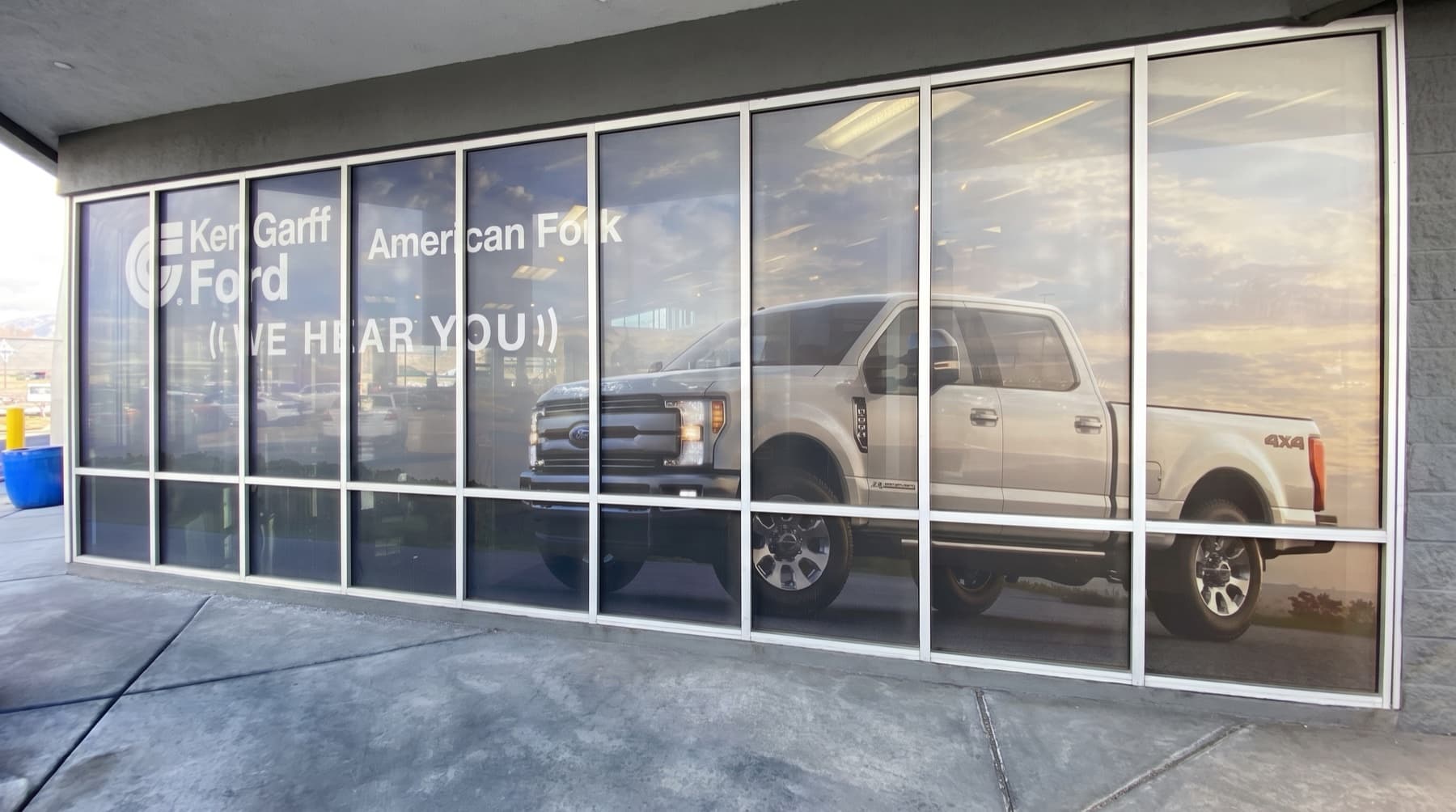Vehicle graphics on dealership glass