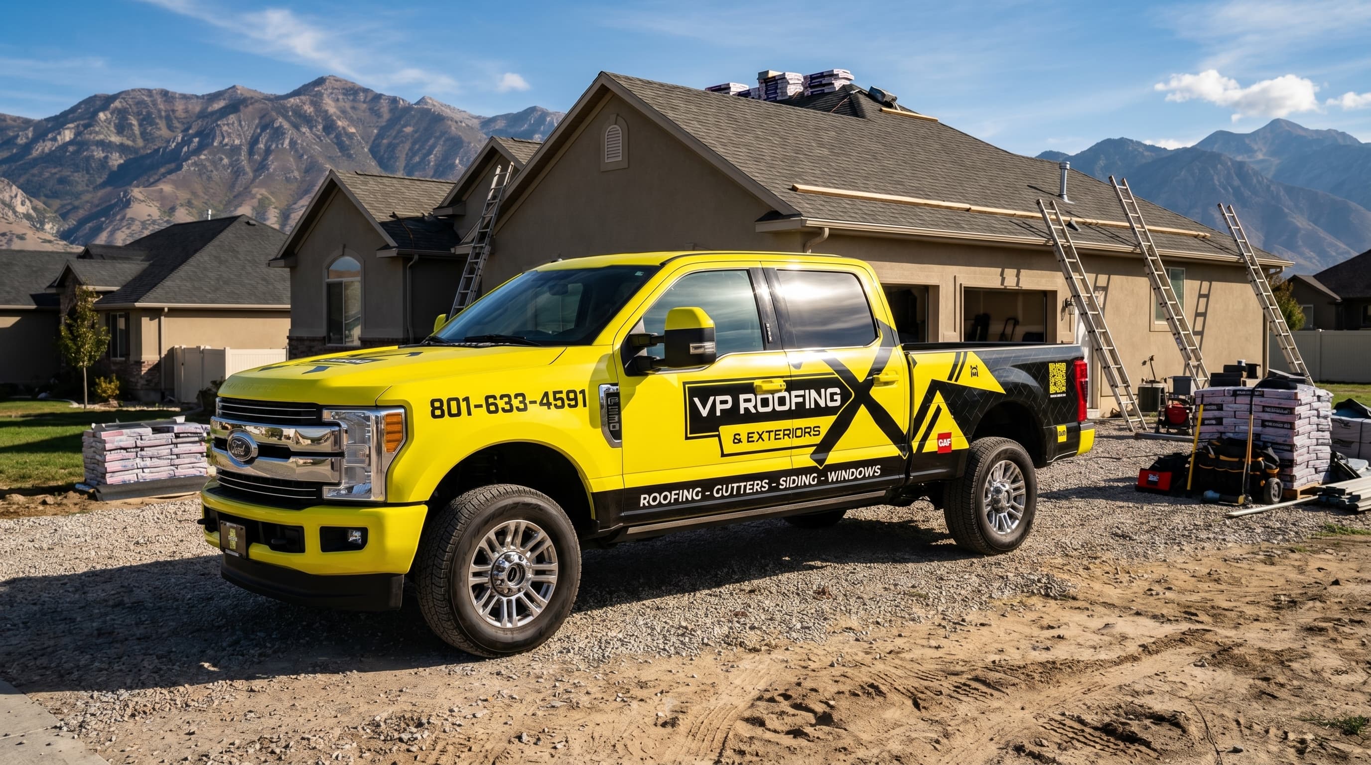 VP Roofing F-350 at a residential roofing job site with the Wasatch behind it